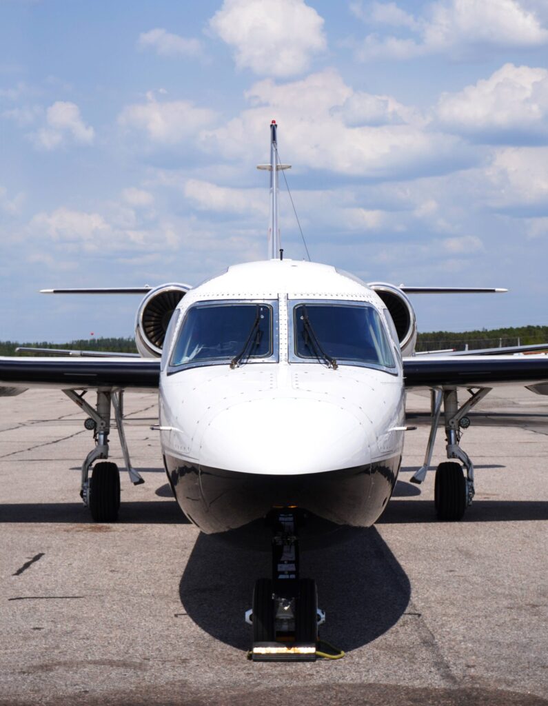 SkyCare Westwind jet parked on the apron
