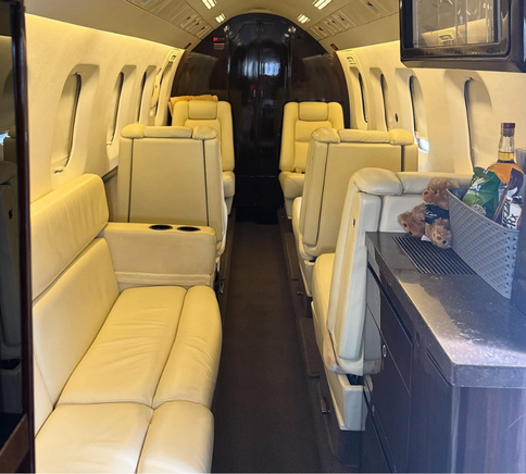 Interior of a SkyCare charter jet configured for passenger travel