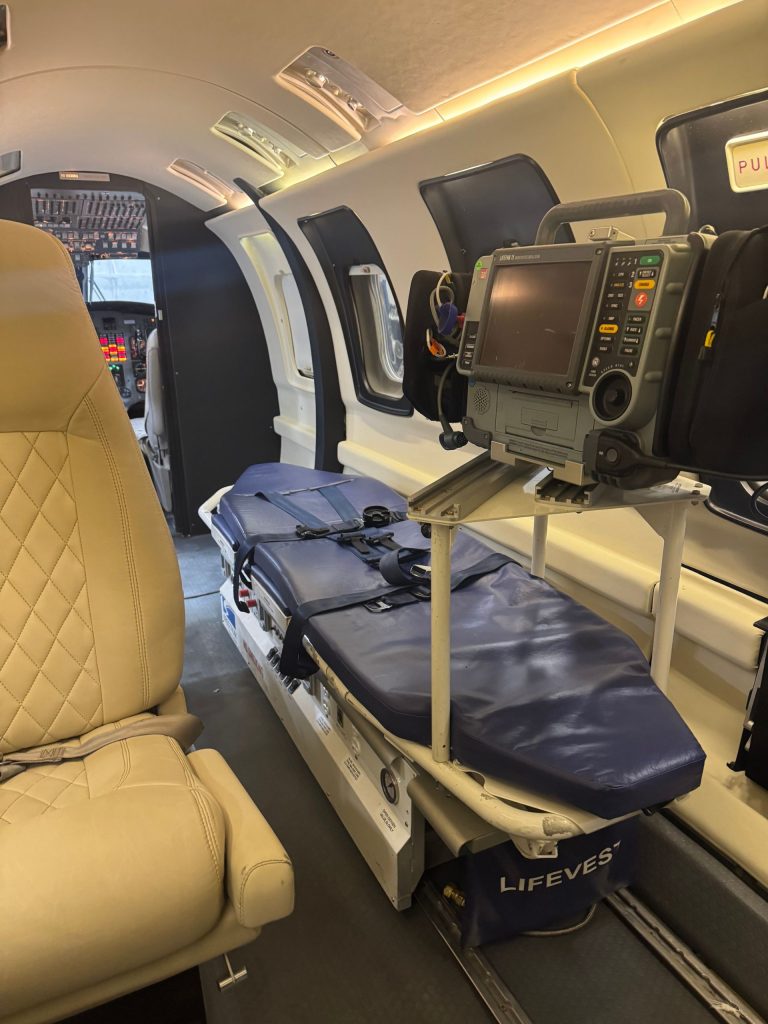 Patient stretcher and medical monitoring equipment inside a SkyCare medical transport aircraft